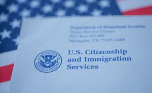 A close up of the u. S. Citizenship and immigration services logo